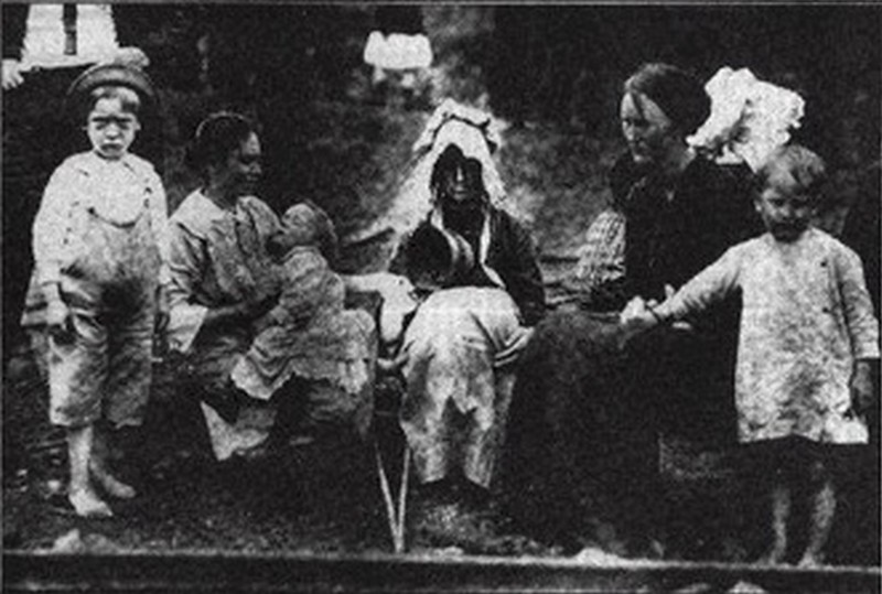 Wives and children of the miners waiting for news