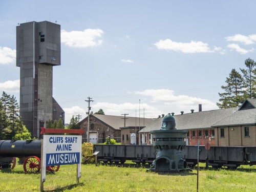 Mining equipment and the headframe built in 1955 on the left.