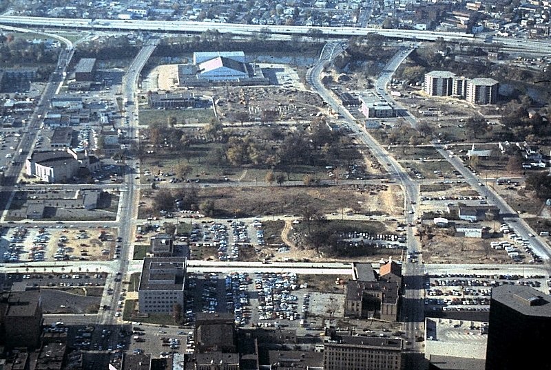 The downtown Charleston landscape during the construction of the new arena. The triangular roof of the original Civic Center can be seen in the upper center. Courtesty of MyWVHome.