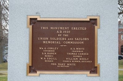 The plaque that states the date the memorial was erected and contains the names of the members of the Union Soldiers and Sailors Memorial Commission who erected it.