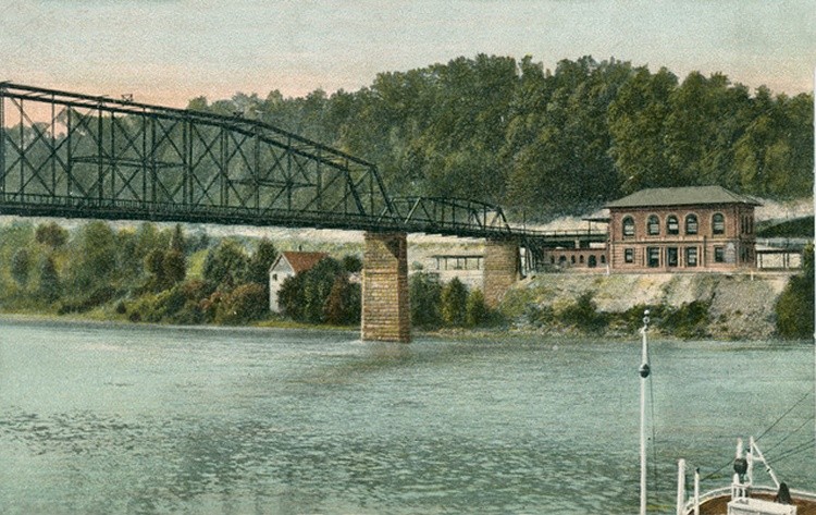 Historic image of original 1891 bridge and C&O Depot on right. Photo courtesy of mywvhome.com, direct link in sources section. 