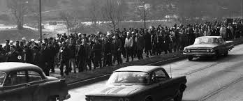 Miners and their family members marching towards the West Virginia state Capital, 1969