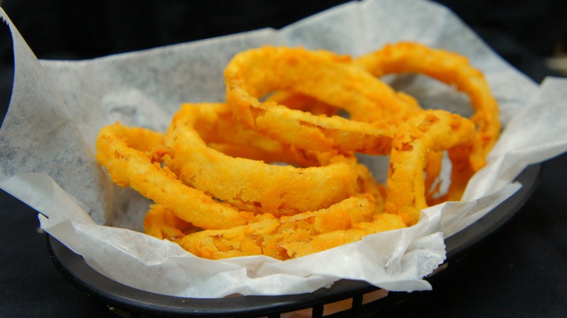 Hand-cut and battered onion rings 