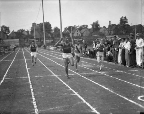 Ralph Metcalfe wins the 100 meter dash at Marquette University Stadium circa 1932 