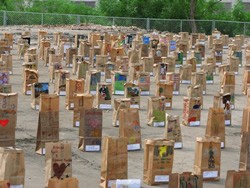 Area schools and community created these markers-one for each of the children and adults who were buried here. By City of Alexandria (reproduced under fair use). 