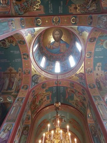 Interior dome with the image of Christos Pantokrator. The interior is full of elaborate and hand-painted icons related to the history and belief structure of the Eastern Orthodox Church.