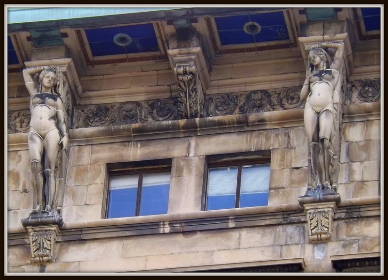 A close-up of the famous nude sculptures around the middle of the tower