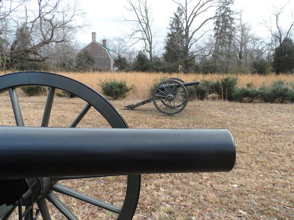 Cannon overlooking the battlefield with the Shelton House in the background.