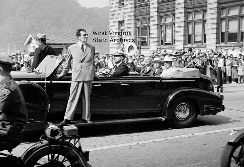 President Franklin D. Roosevelt in a parade car with Governor Homer Holt and Senator Matthew Neely on Kanawha Boulevard near the Union Building, Charleston, 3 September 1940. Photo: Malcolm R. Mathews Jr. Malcolm R. Mathews Jr. Collection, West Virginia S