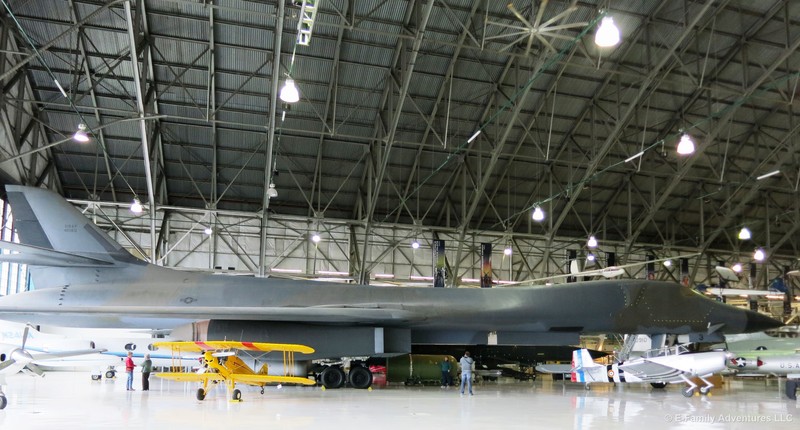 The massive B1-A Lancer with smaller aircraft in the foreground.
