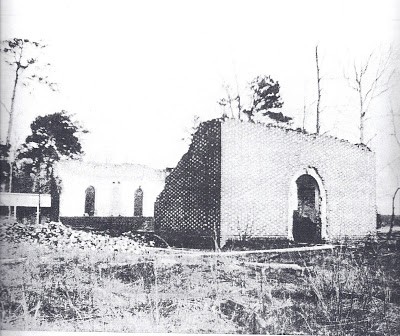 This picture was taken sometime before the church was rebuilt and is a view of the north front corner. 