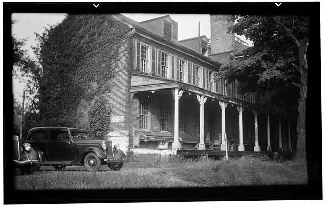 Southwest corner of the west wing of the main building, photographed in 1936 by Joseph P. Sims (image from HABS)