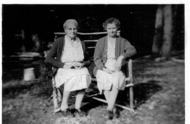 Mrs. Ayda Niemoth (on left) and Mrs. Louise Winter (on right) in front of the Niemoth Cabin, circa 1934.