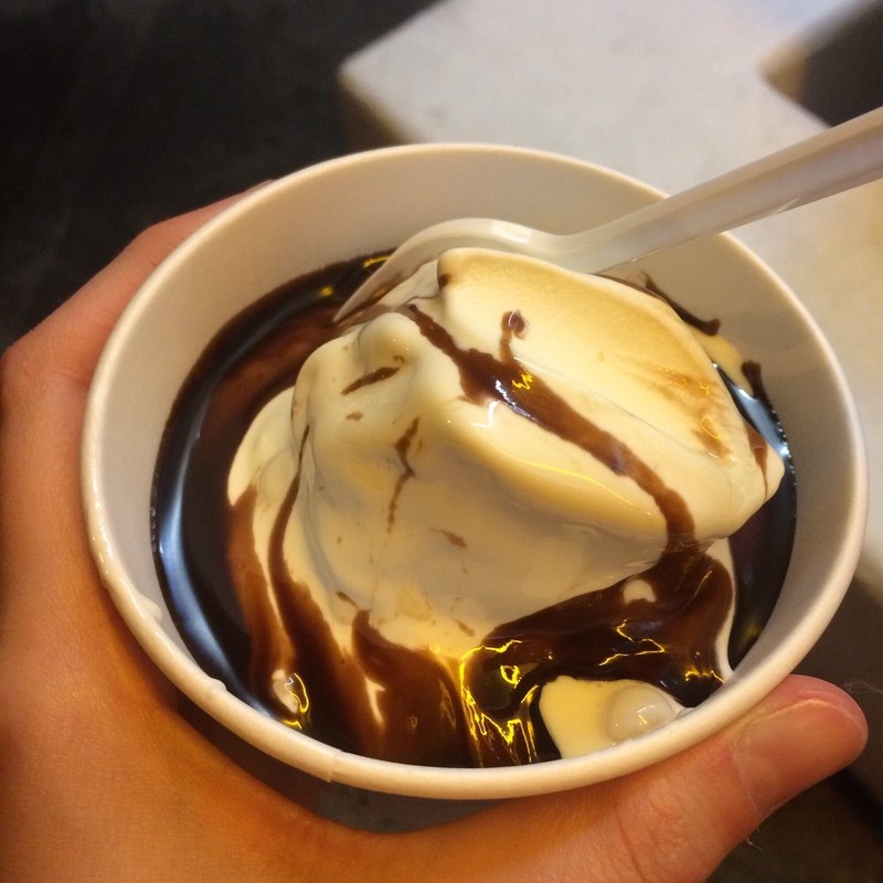 Vanilla custard with hot fudge drizzled on top