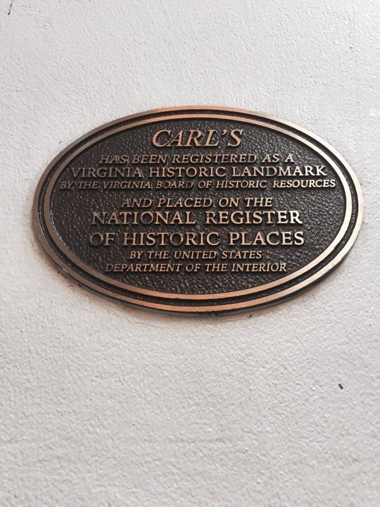 The Plaque on the wall of the building that designates Carl's as a part of the National Register of Historic Places.