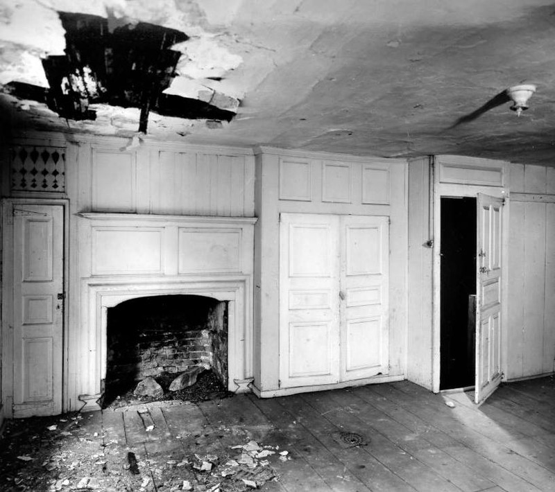 The guest bedroom before the building was restored