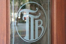 Tampa Theatre logo etched on its front doors