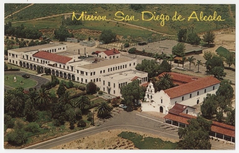 A 1960 postcard reveals an aerial view of the Mission, fully restored two decades earlier 