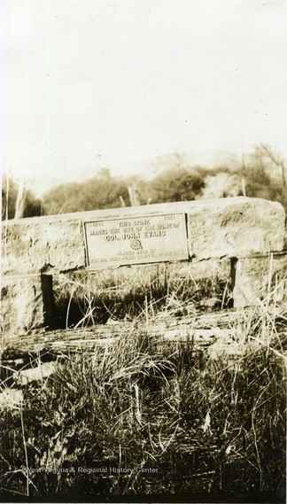 Plaque commemorating John Evans' home. The stone arch of the plaque was rescued from Evans fireplace, where George Washington purportedly conducted business while near Morgantown.