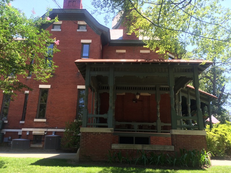 A view of the northern facade, taken facing south. This perspective emphasizes the iconic large verandah.