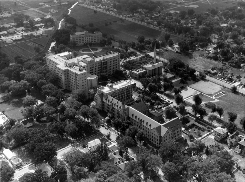 Aerial view of St. Agnes Hospital with convent in the foreground and St. Agnes School of Nursing in the background, 1957