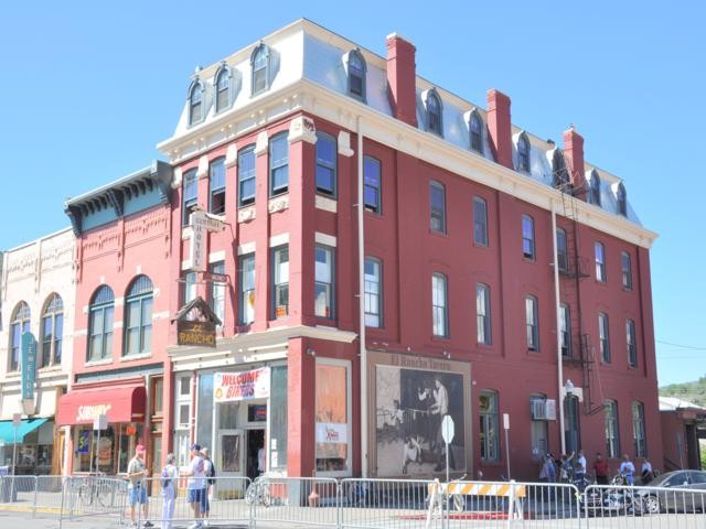 The side of the building includes a mural of the bout between Jack Dempsey and  Andy Malloy.