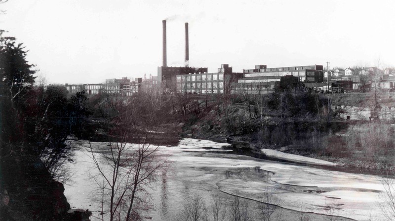 Gillette Rubber Co. with Eau Claire River in front (ca. 1918-1939)