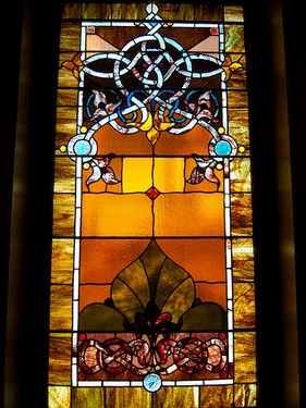 Stained glass window in the Arts and Crafs style. Photo by beautifulcataya licensed under Creative Commons: https://creativecommons.org/licenses/by-nc-nd/2.0/legalcode