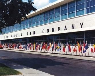 The front of the building, featuring the company's extensive collection of national flags.