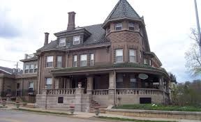 The House's Outside. The gorgeous wrap around porch can be seen. 