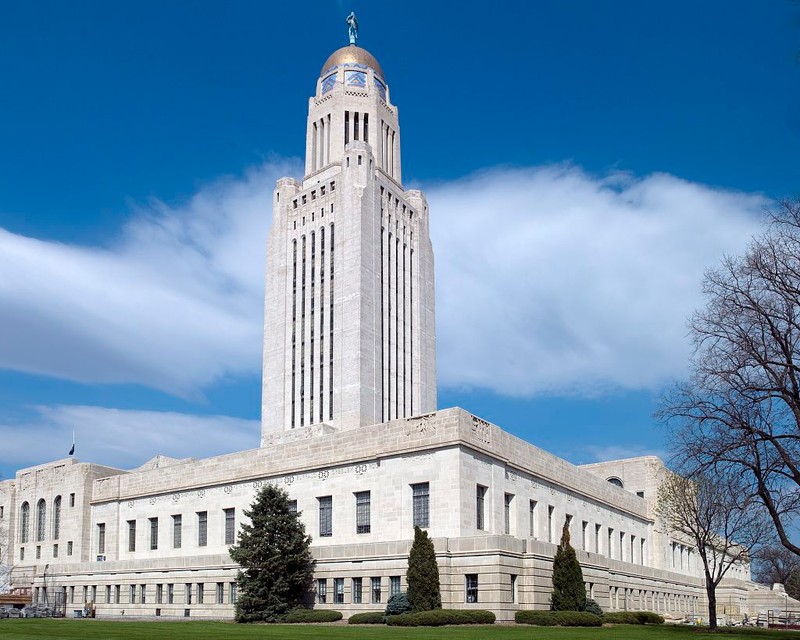 The Nebraska State Capitol was built in 1932 after ten years of construction. The tower rises to a height of 400 feet and is topped with a large statue called "The Sower." 