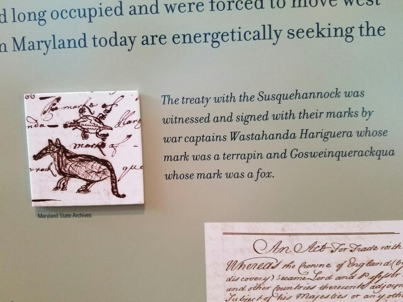 Information board in St. John's Museum in St. Mary's City. About the Native America's signing documents with the officials of the town. 
Photo by Amber Steffey