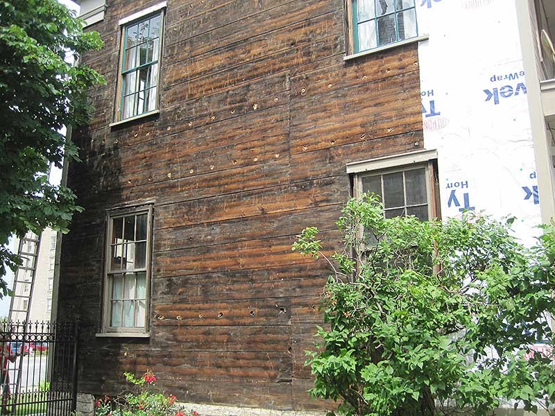 Old wooden siding exposed during renovation