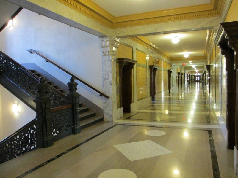 The main corridor has marble walls and oak woodwork