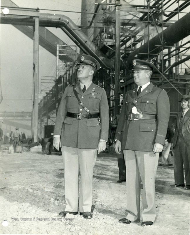 General Leslie Groves (left), commander of the Manhattan Project, visits the Morgantown Ordnance Works in November 1941