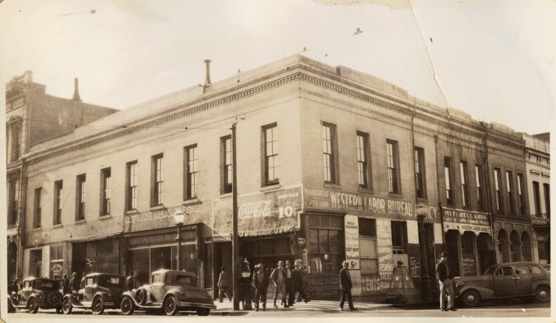 In 1936, the building appears to have duplicated its 1850s setup--with private business below and government functions on the second floor. (California State Library).