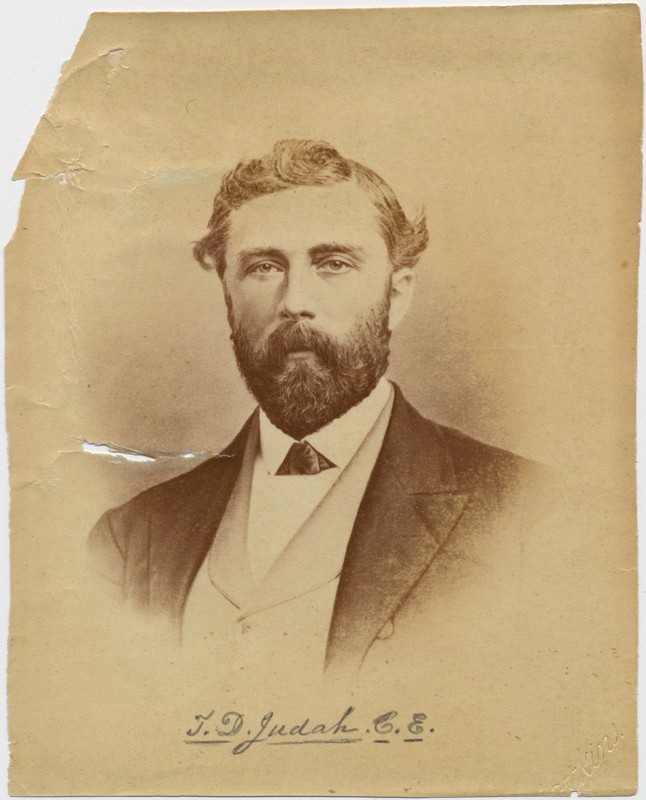 Theodore Judah, architect of the Transcontinental Railroad. Working with "The Big Four" businessmen who owned the Central Pacific Railroad, he masterminded a route through the Sierra Nevada Mountains, though he would die in a year into construction.