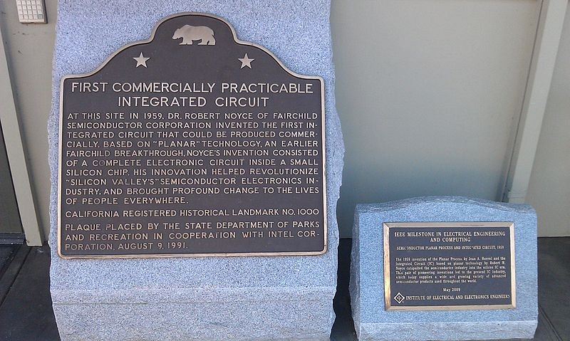 The marker is located outside the former home of Fairchild Semiconductor Corporation, now home to a company called Collective Creations.