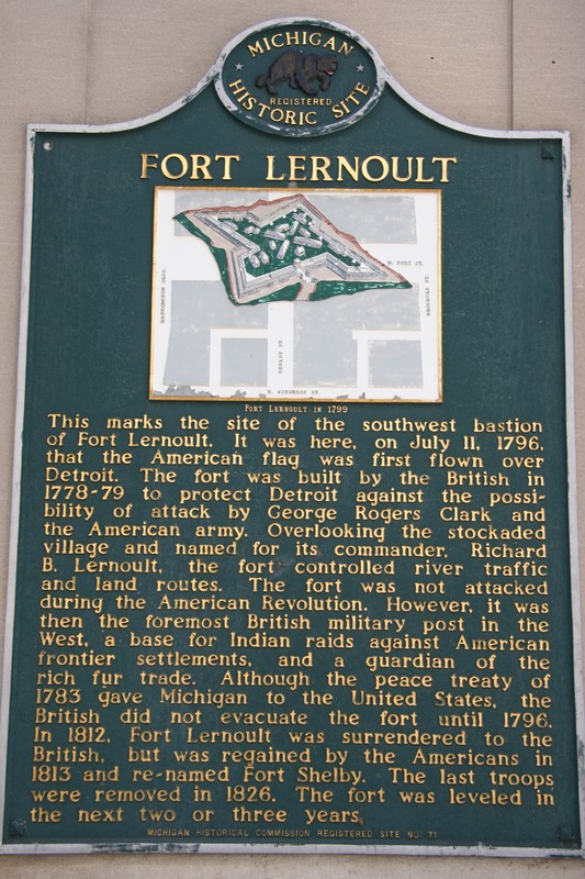 Historical marker on the side of the Comerica Bank building at the corner of Fort St and Shelby St