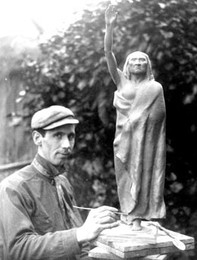 Sculptor James Wehn with a model of the Chief Seattle statue in 1908 (image from History Link Encyclopedia)