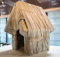Photo by DJ Ashton, courtesy of the Charles M. Schulz Museum and Research Center. Christo Wrapped Dog House