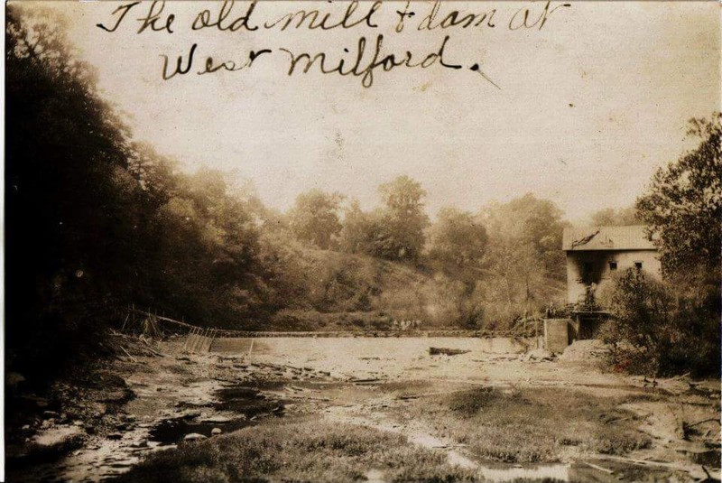 This photo shows the old grist mill dam being modified to its current state sometime around 1920 Notice in the fire damage on the upper left-hand side of the mill.
Ca.1922. Courtesy Milford Wheel