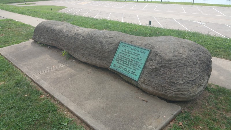 A picture of the tablet and the stone upon which it resides