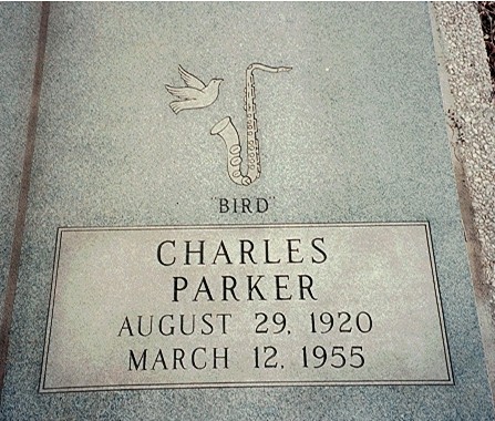 Charlie Parker played an alto sax, not a tenor saxophone as depicted on his headstone.