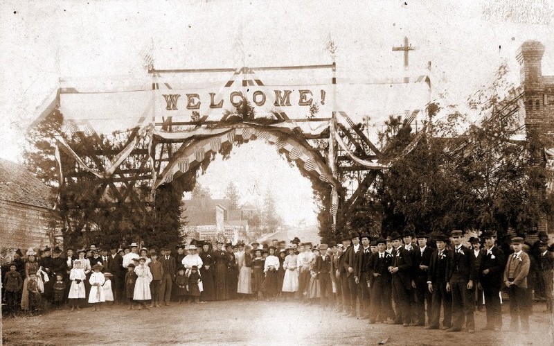 Dignitaries and residents are welcomed at the foot of Normal Ave [College Ave] on October 15, 1895.