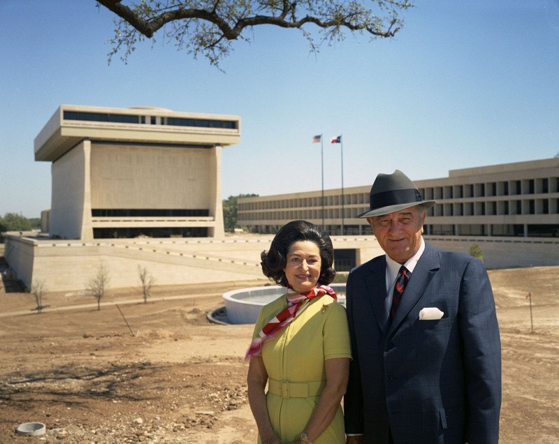Lyndon and Lady Bird Johnson posing in front of the new Lyndon Baines Johnson Library and Museum both took an active role in planning