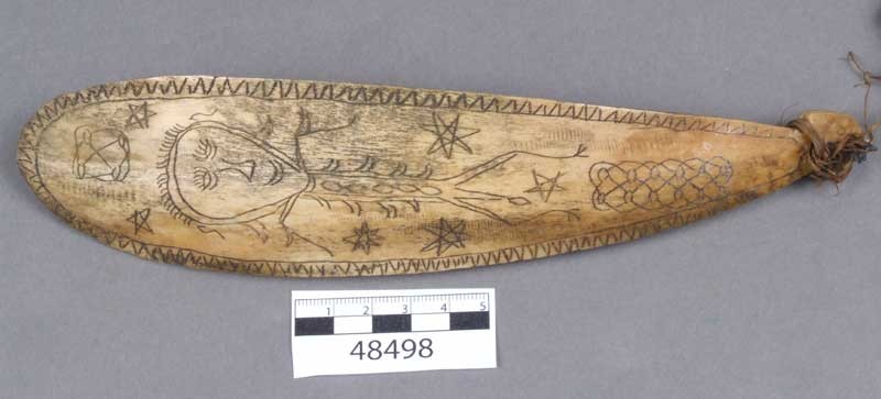 A decorated rib bone from Sumatra, Indonesia