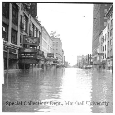 4th Avenue during the 1937 flood. Hotel Governor Cabell is visible in the background. Courtesy of Marshall University Special Collections.