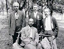 Niagara Movement leaders W. E. B. Du Bois (seated), and (left to right) J. R. Clifford, Lafayette M. Hershaw, and Freeman H. M. Murray at Harpers Ferry.