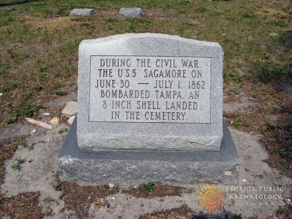 This marker describes the landing of a shell from the Sagamore that landed in just inside the gate of Tampa's Oaklawn Cemetery. The marker sits where the shell landed. 